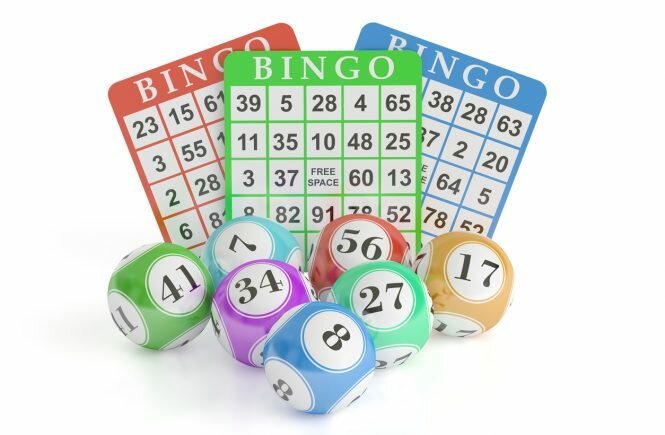 Bingo concept, lottery balls and cards. 3D rendering isolated on black background